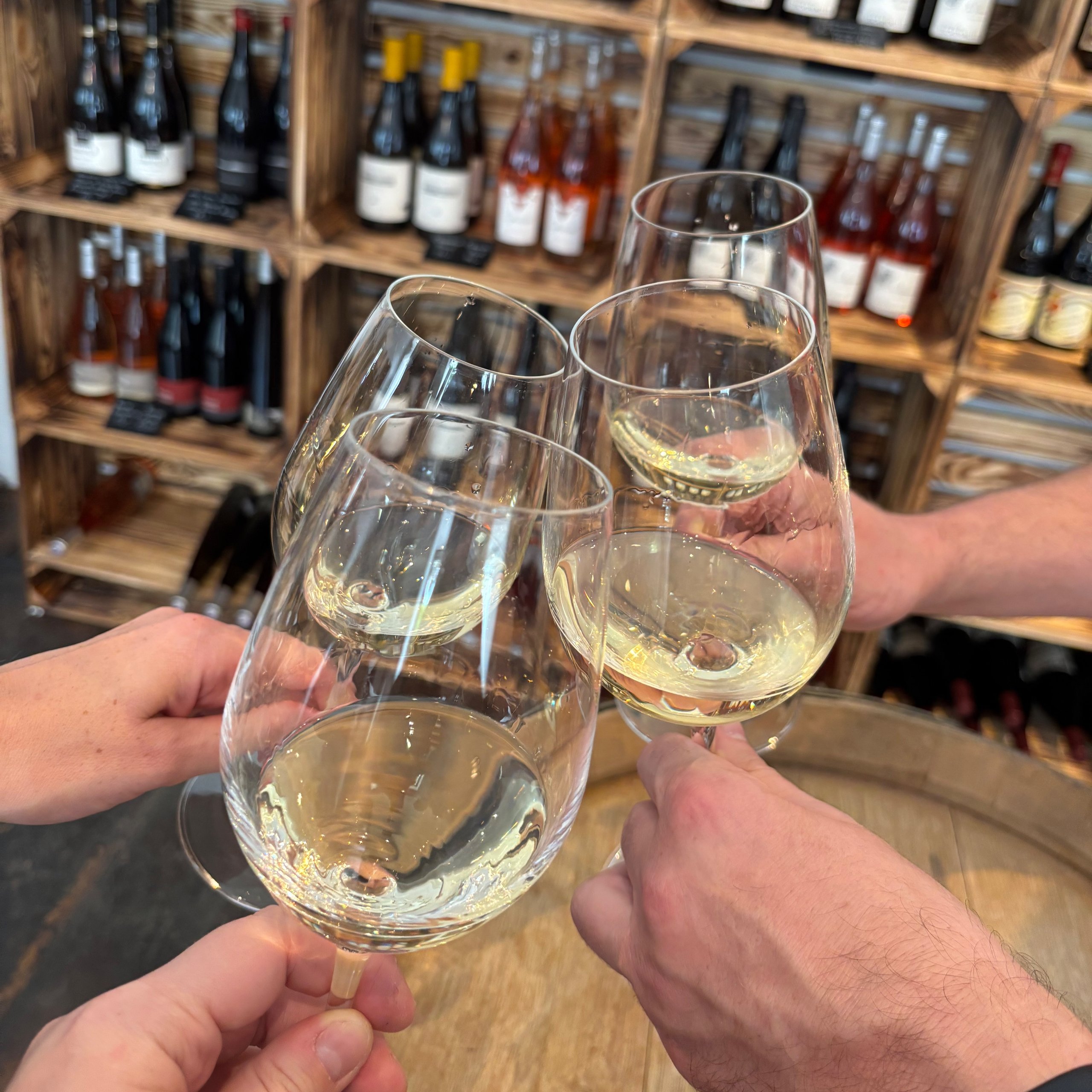 clear wine glass overlooking orchard during daytime